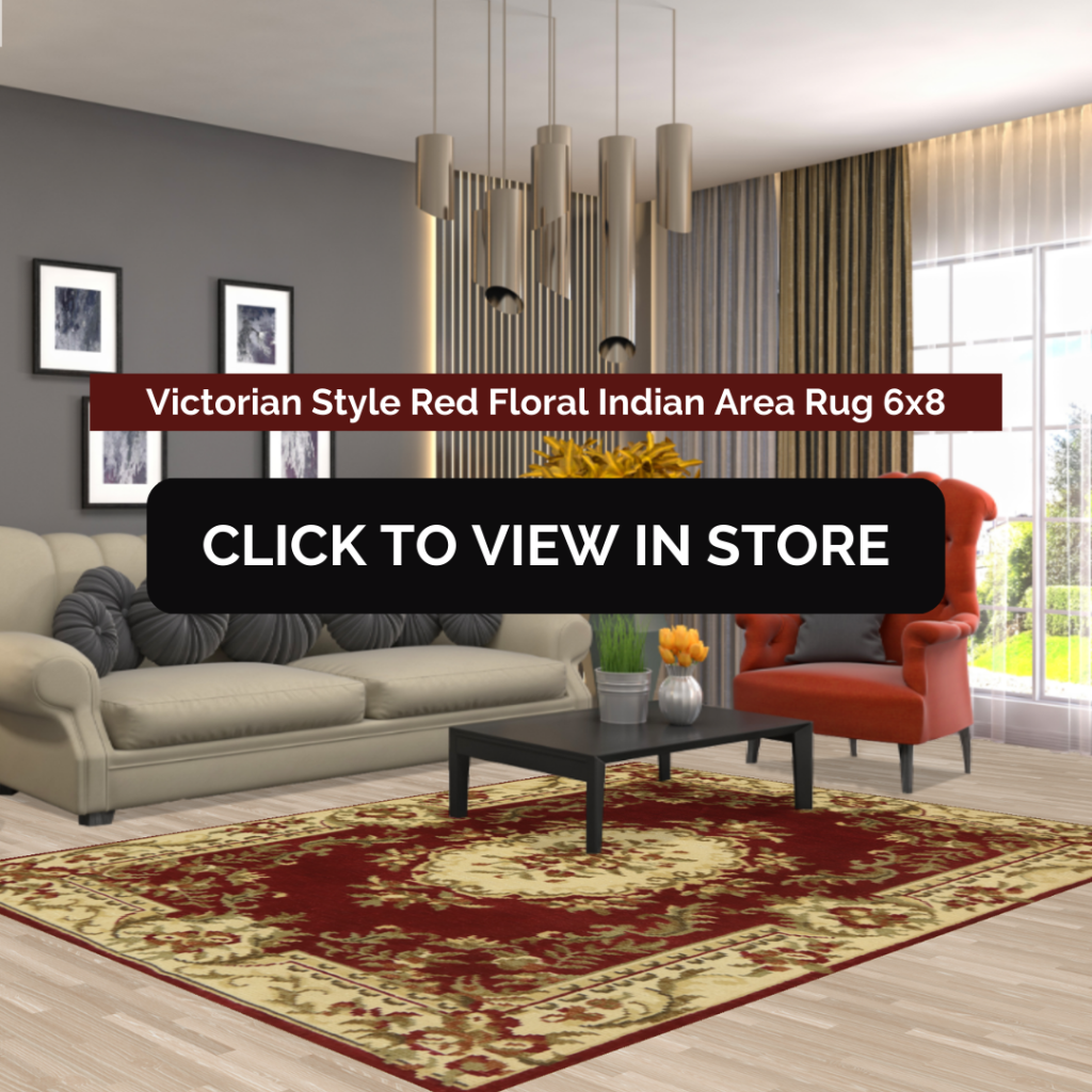 Modern living room showcasing a 6x8 Victorian Style Red Floral Indian area rug with intricate floral designs in rich red and beige tones. The rug anchors the space, complemented by a beige sofa adorned with gray throw pillows, a bold orange armchair, and a sleek black coffee table. Decorative elements like yellow flowers and contemporary pendant lighting complete the sophisticated ambiance.