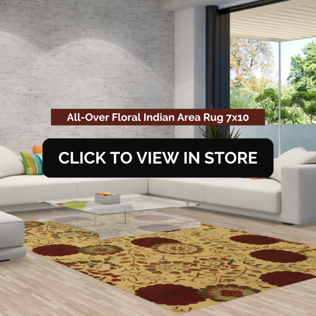 A spacious modern living room showcasing a 7x10 All-Over Floral Indian Area Rug. The rug features a warm golden background with bold red floral patterns, perfectly complementing the neutral-toned sectional sofa and sleek glass coffee table. Bright cushions and natural lighting enhance the inviting atmosphere of the space.
