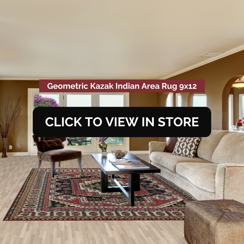 A spacious living room featuring a Geometric Kazak Indian Area Rug (9x12) with intricate patterns in red, black, and beige tones, placed on a light wooden floor. The room includes a beige sectional sofa with patterned pillows, a black coffee table, a brown ottoman, and large windows allowing natural light to flood the space. The image contains text: "Geometric Kazak Indian Area Rug 9x12" and a call-to-action button: "CLICK TO VIEW IN STORE."