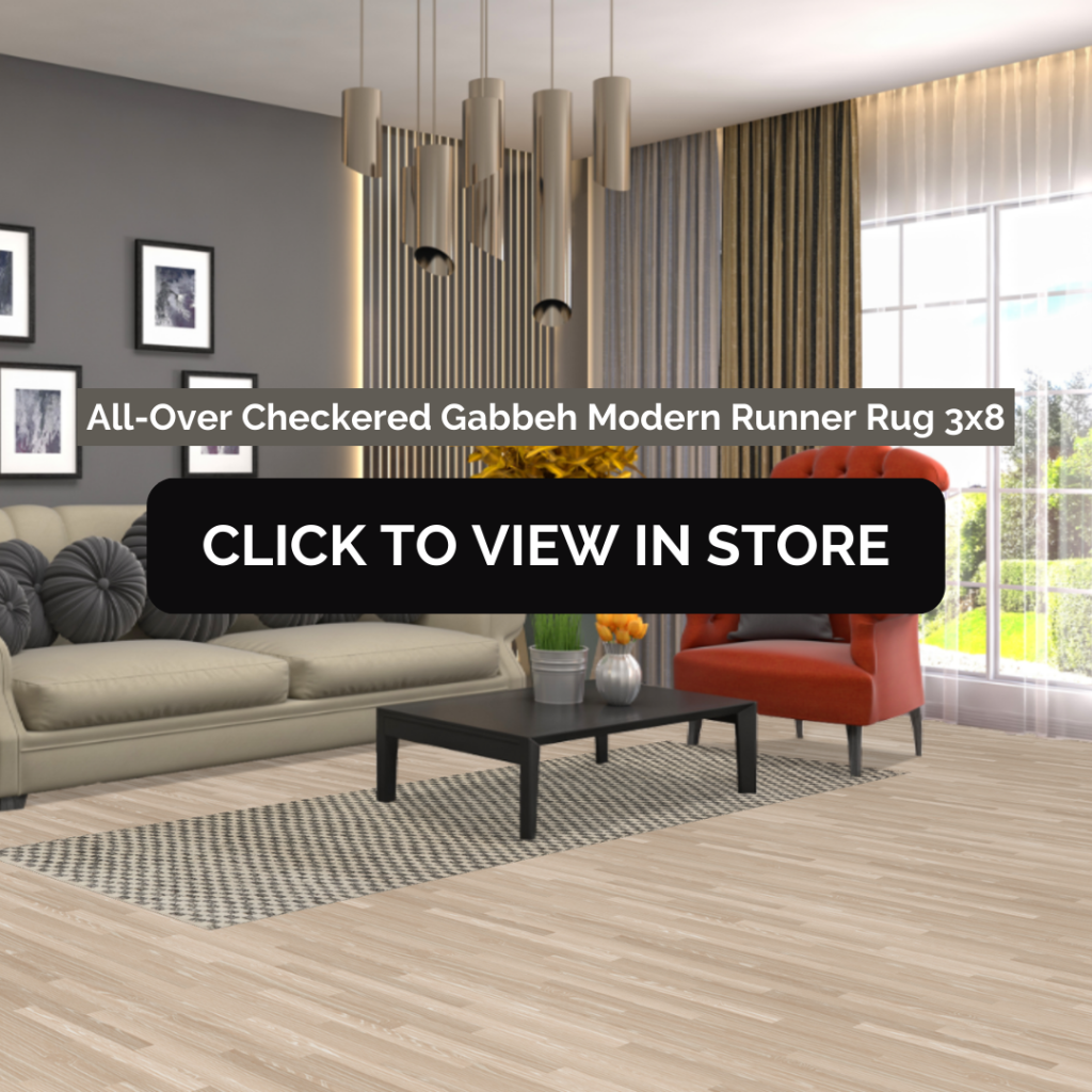 A modern living room featuring a black and white checkered Gabbeh runner rug (3x8) placed on a light wooden floor. The room has a beige sofa with decorative pillows, a black coffee table, a red armchair, and contemporary lighting fixtures. A large window with sheer curtains allows natural light to enter. The image includes text that reads: "All-Over Checkered Gabbeh Modern Runner Rug 3x8" and a call-to-action button stating: "CLICK TO VIEW IN STORE."