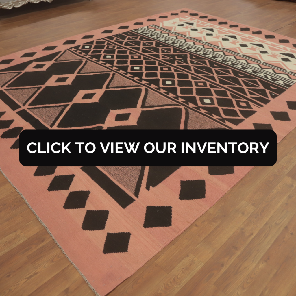 Geometric Kilim Oriental Rug
This pink and black Oriental Kilim rug features bold geometric patterns, including diamonds and lattice designs. Laid on a hardwood floor, the rug's striking contrast adds a dramatic, tribal-inspired flair to any space.