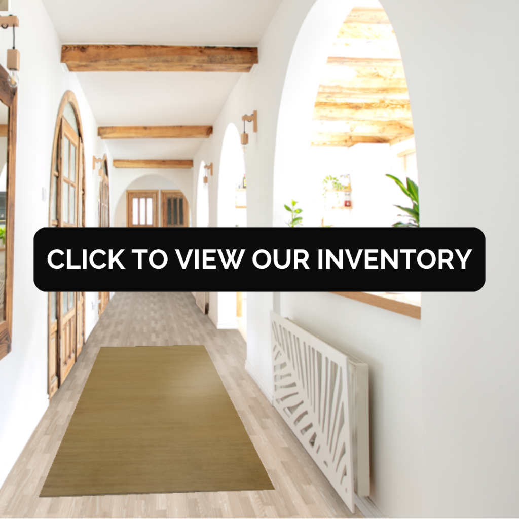 A bright hallway with arched doorways, wooden ceiling beams, and a golden beige runner rug laid over light wood flooring. The text overlay invites viewers to explore the inventory.