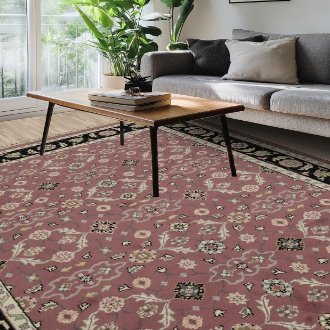 “Mid-century style living room with gray sofa, wood coffee table, and a red floral patterned area rug.”